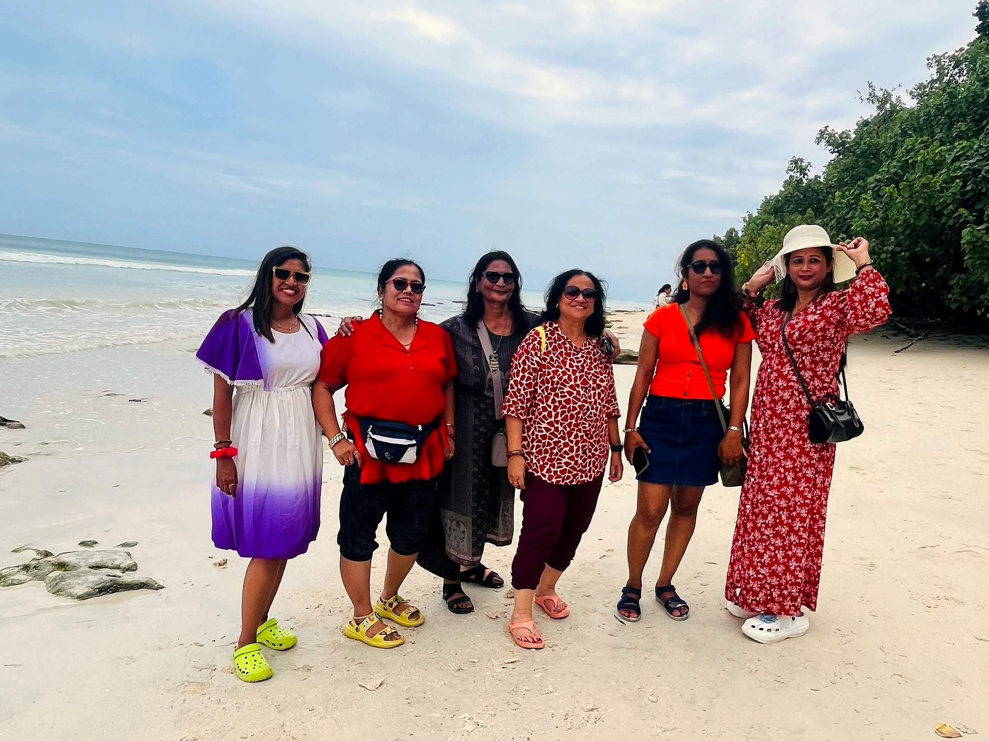 A group of ECHEPURON travellers on a white-sand beach in the Andaman Islands
