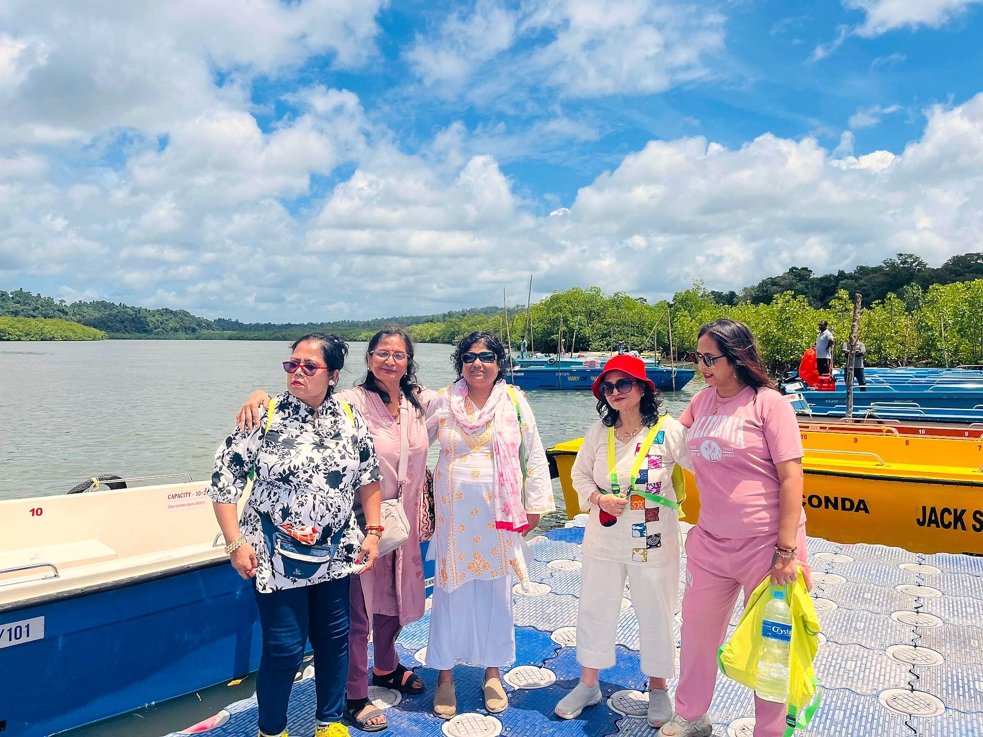 ECHEPURON travellers on a jetty beside a turquoise lagoon in the Andaman Islands