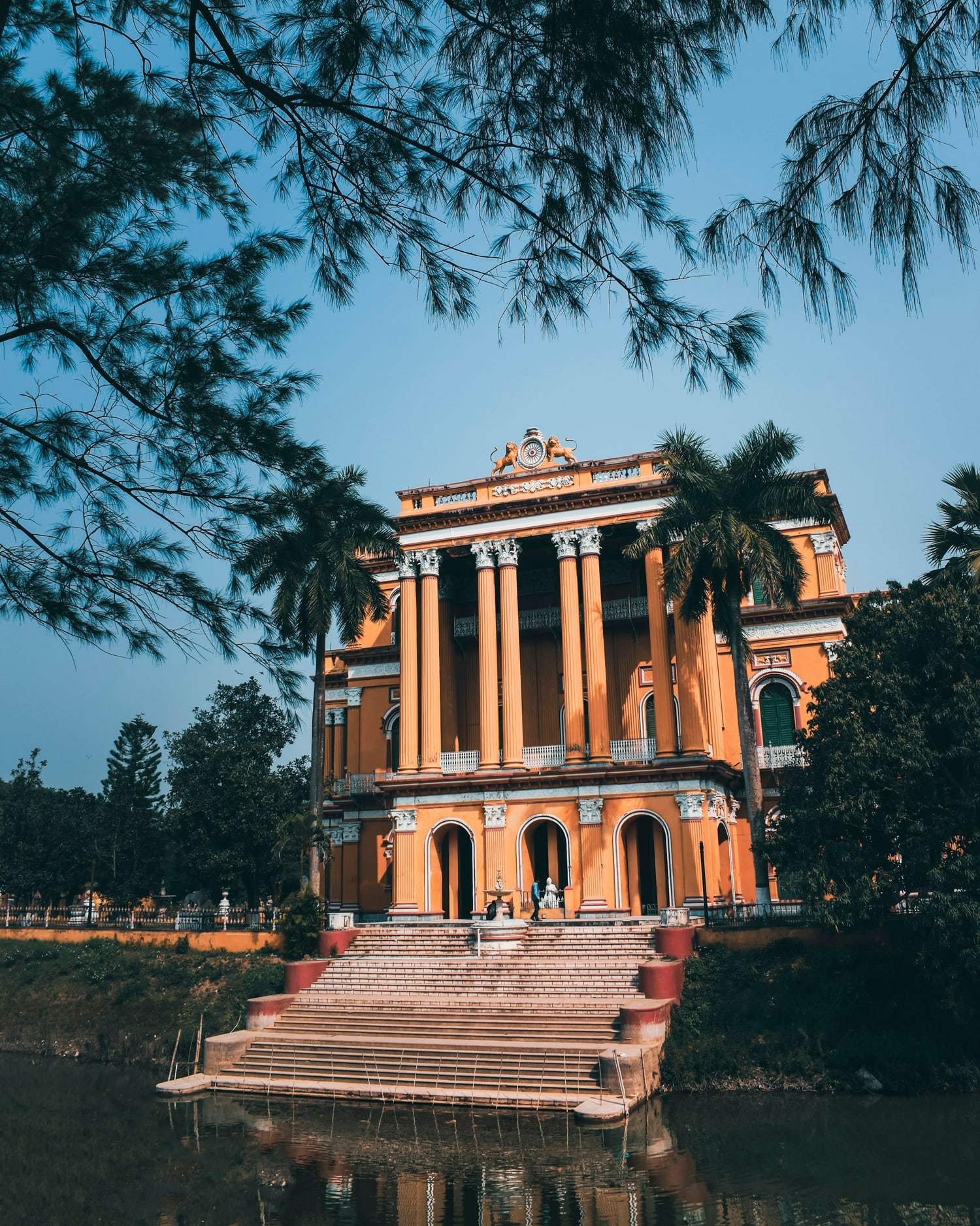 The colonnaded facade and grand staircase of Hazarduari Palace
